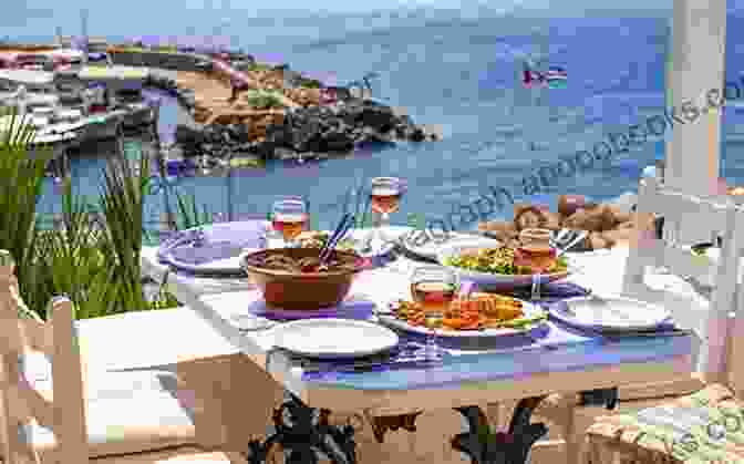 A Group Of People Enjoying A Traditional Greek Meal On An Outdoor Terrace Overlooking The Aegean Sea. Return To The Aegean 1