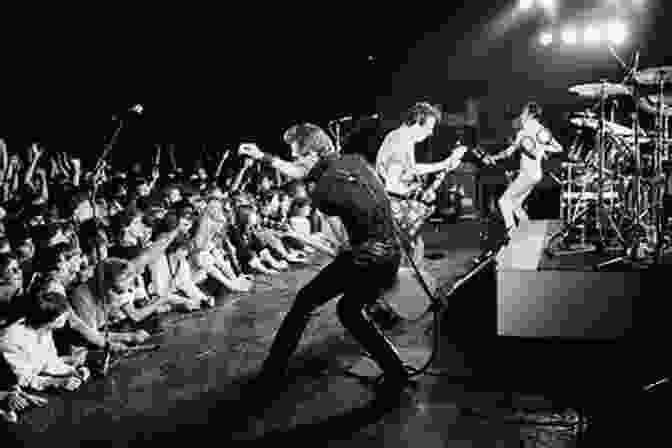 A Photograph Of The Clash Performing At A Benefit Concert, Highlighting Their Commitment To Social Activism. Stealing All Transmissions: A Secret History Of The Clash