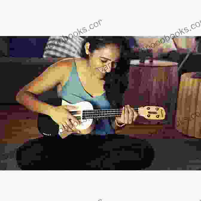 A Smiling Woman Strumming A Ukulele Ukulele In 5 Days: How To Play Ukulele For Beginners