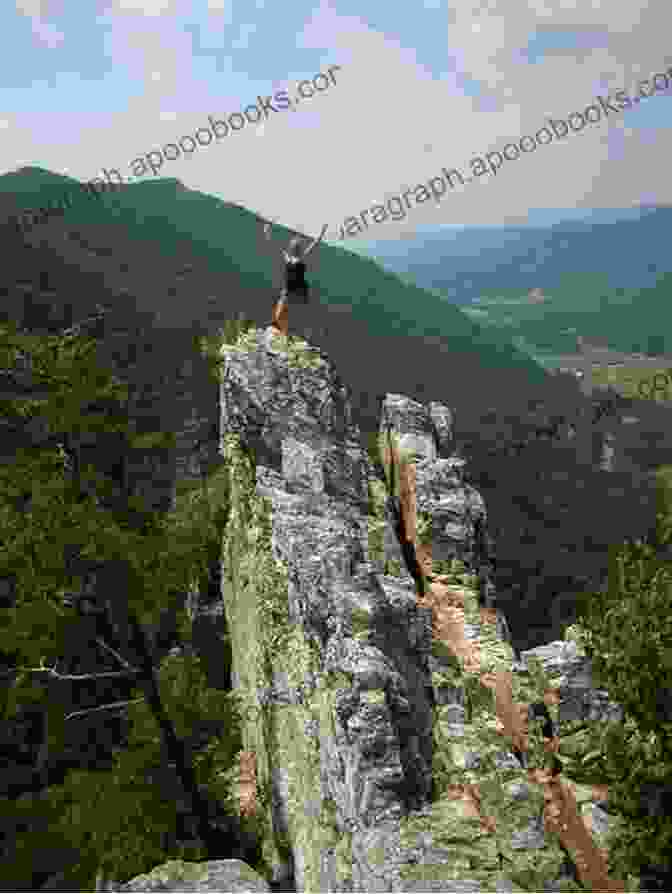 Hiker Navigating A Challenging Mountain Trail, Surrounded By Towering Rock Formations Mountains On My Mind: Poems Of The Mountain West