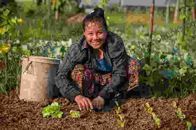 Women Farmers Working In A Field, Showcasing Their Role In Securing Food Security Woman S Role In Economic Development